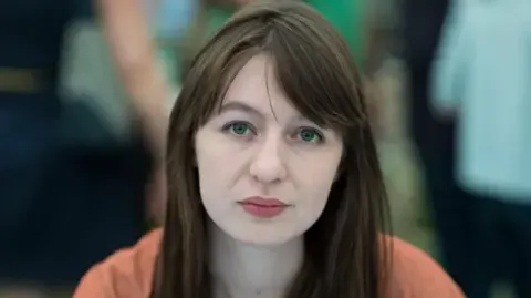 Irish author Sally Rooney states she is unable to enter the UK because of arrest fears